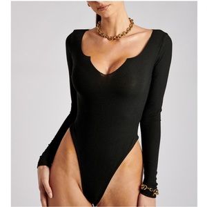 Meshki 
SIZE XS but fits SMALL 
Worn once